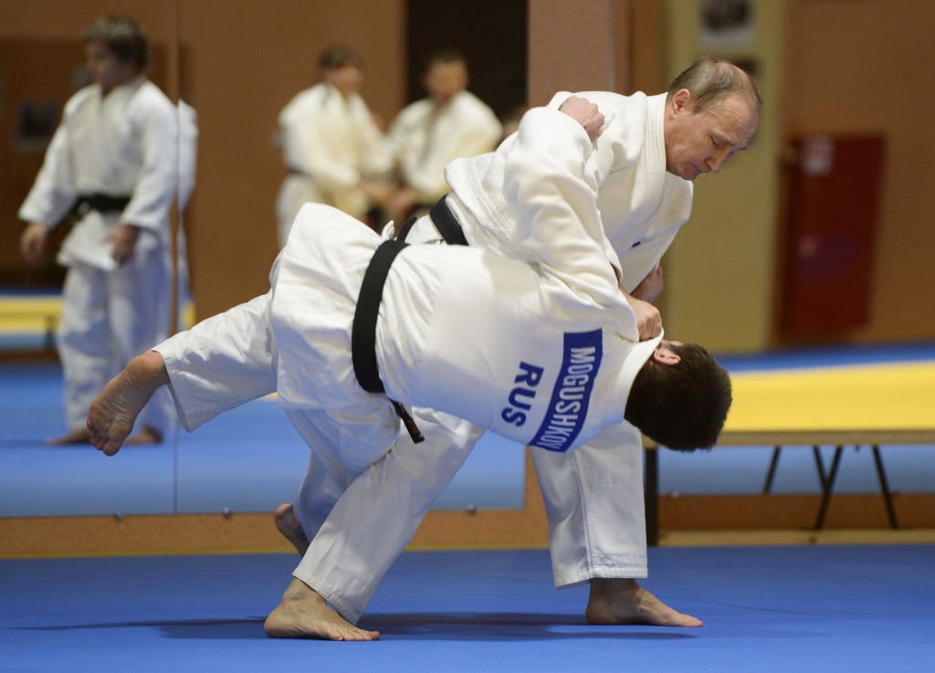Russian President Vladimir Putin (top) is a judo fan and is a black belt. Photo: EPA-EFE