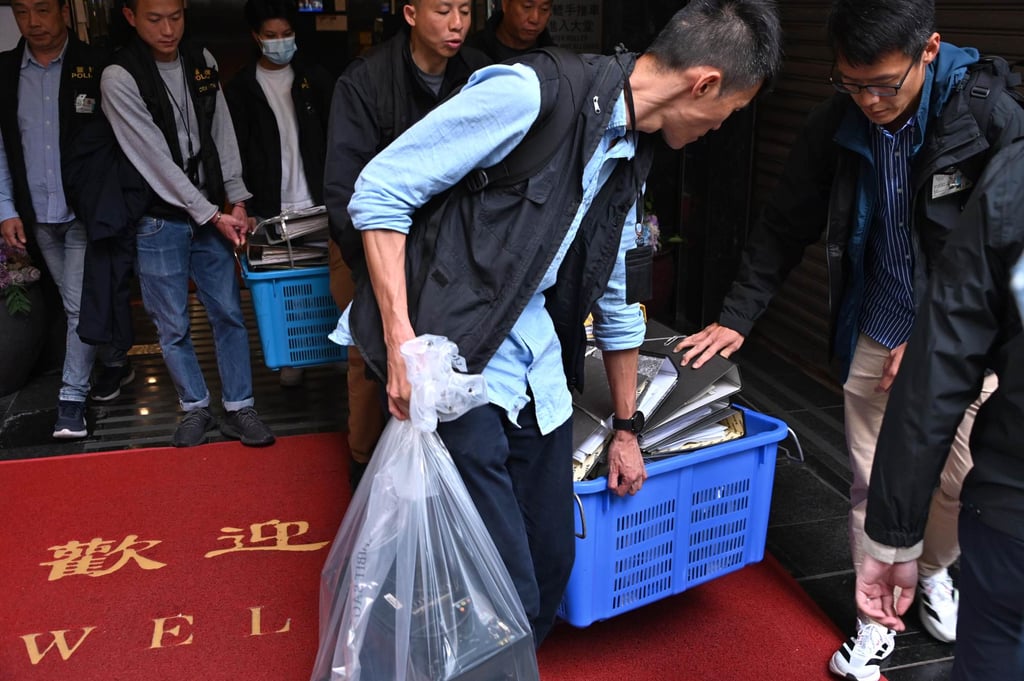 Police removed documents from the offices of Prestige Construction & Engineering Company. Photo: Handout Police removed documents from the offices of Prestige Construction & Engineering Company. Photo: Handout