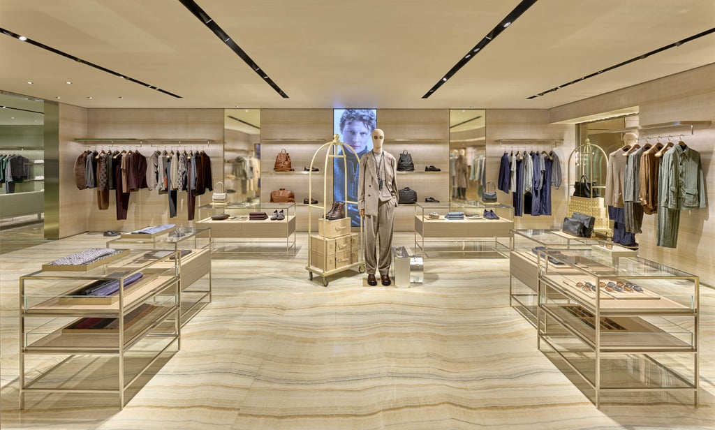 An LED screen becomes a focal point for the main room at the new Giorgio Armani menswear boutique in Hong Kong. Photo: Handout