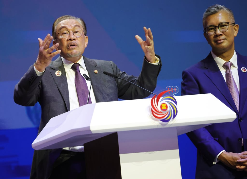 Malaysia’s Prime Minister Anwar Ibrahim (left) speaks beside Minister of Investment, Trade and Industry Tengku Zafrul Aziz after the closing of the Asean Summit in Kuala Lumpur on October 28. Photo: EPA Malaysia’s Prime Minister Anwar Ibrahim (left) speaks beside Minister of Investment, Trade and Industry Tengku Zafrul Aziz after the closing of the Asean Summit in Kuala Lumpur on October 28. Photo: EPA