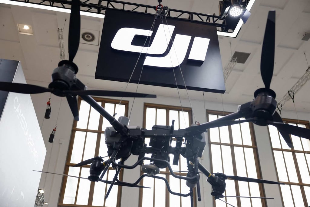 At the briefing, slides said equipment “must possess decoding functions” for the drone transmission system used by DJI. Photo: AFP