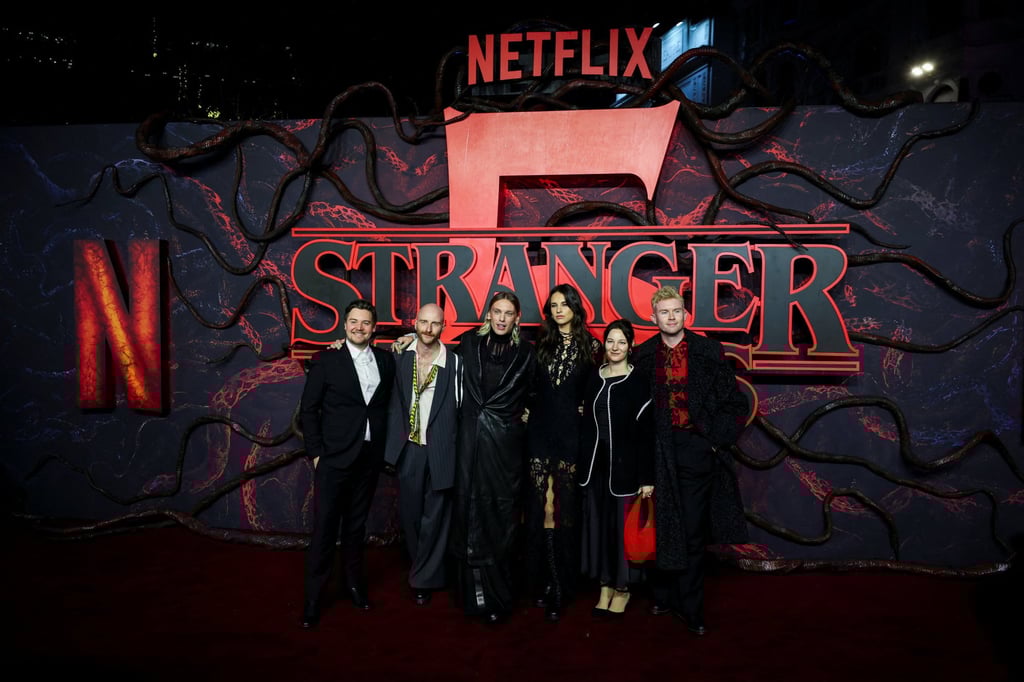 Jamie Campbell Bower (third from left) and guests attend the screening for the final season of the television series Stranger Things, at Odeon Luxe Leicester Square in London, Britain, on November 13. Photo: Reuters
