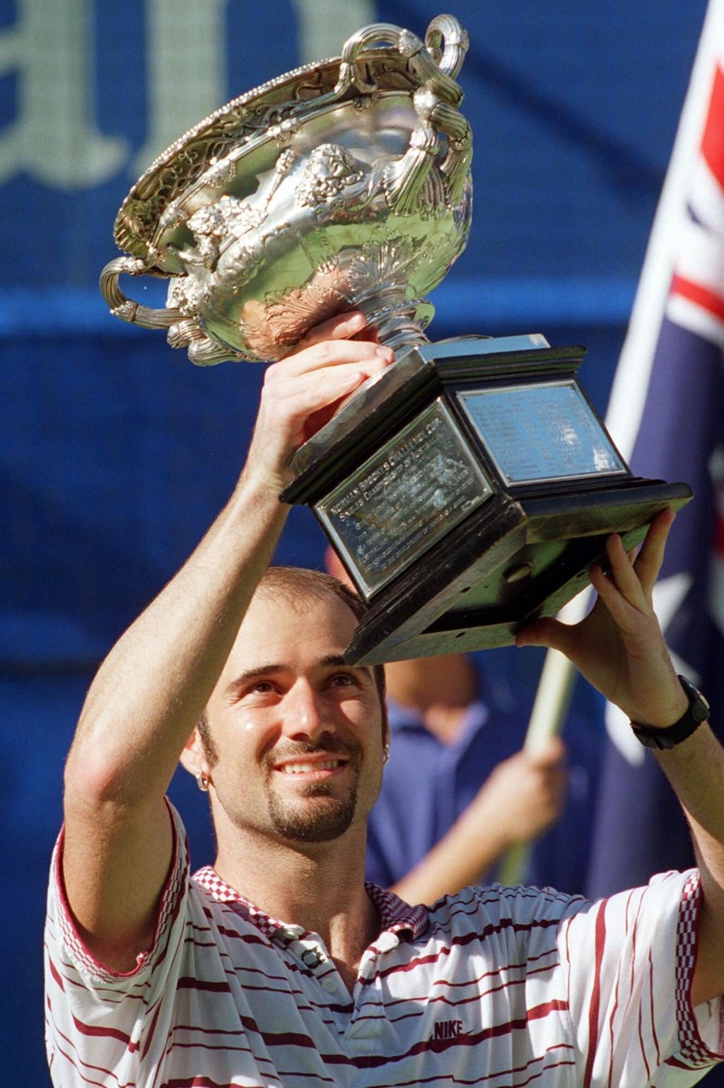 Andre Agassi holds his Australian Open trophy after defeating fellow American Pete Sampras in the final in Melbourne, in 1995. Photo: AP