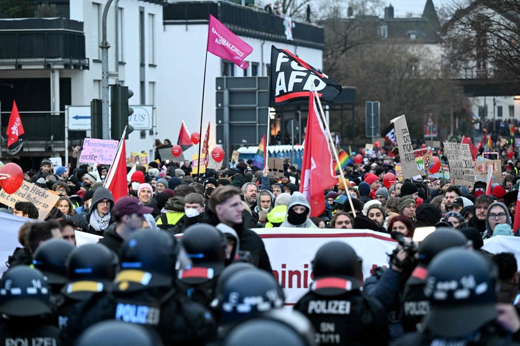Demonstrators face police on Saturday during a protest against a two-day convention of the far-right Alternative for Germany (AfD) party. Photo: AFP