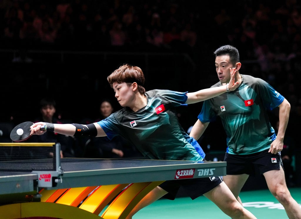 Wong Chun Ting (right) and Doo Hoi Kem in action in Chengdu. Photo: Xinhua Wong Chun Ting (right) and Doo Hoi Kem in action in Chengdu. Photo: Xinhua