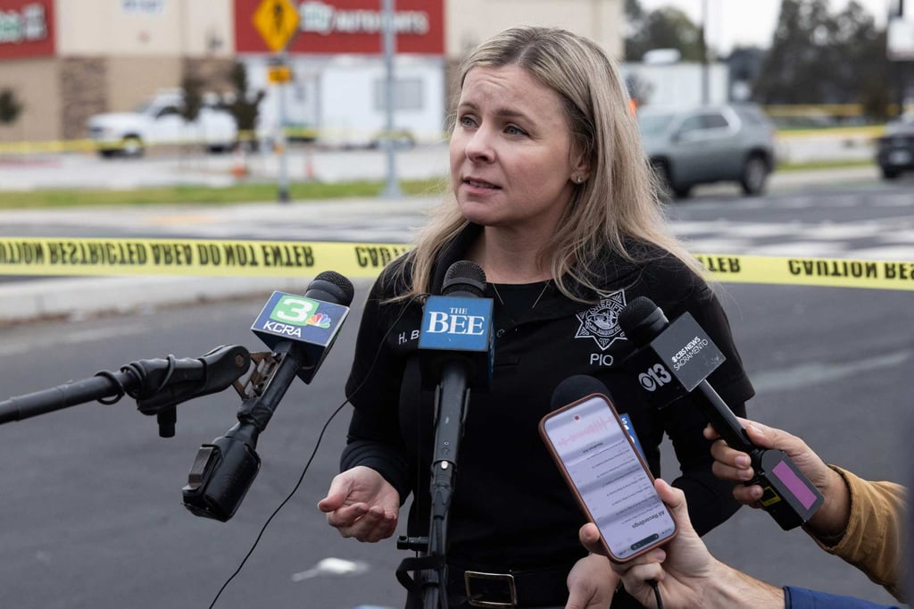 Heather Brent, a spokeswoman for San Joaquin County sheriff’s office, speaks to the media during a press conference near the scene of a shooting in Stockton, California on Sunday. Photo: Getty Images via AFP