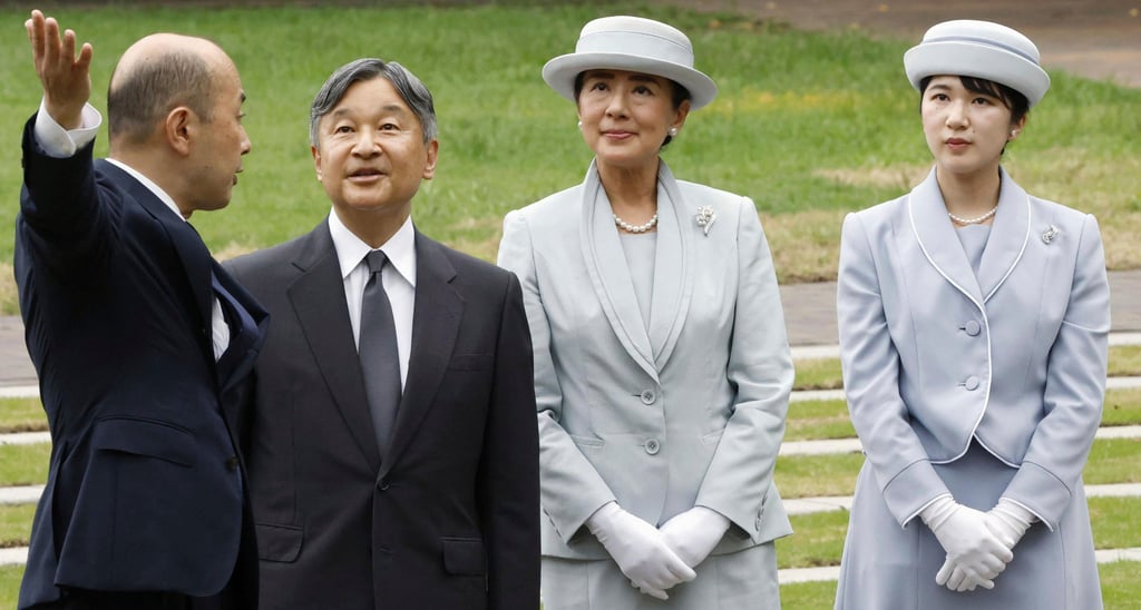 Japanese Emperor Naruhito, Empress Masako and Princess Aiko listen to Nagasaki Mayor Shiro Suzuki (left) as they visit a cenotaph for atomic bombing victims on September 12. Photo: Kyodo/AP Japanese Emperor Naruhito, Empress Masako and Princess Aiko listen to Nagasaki Mayor Shiro Suzuki (left) as they visit a cenotaph for atomic bombing victims on September 12. Photo: Kyodo/AP