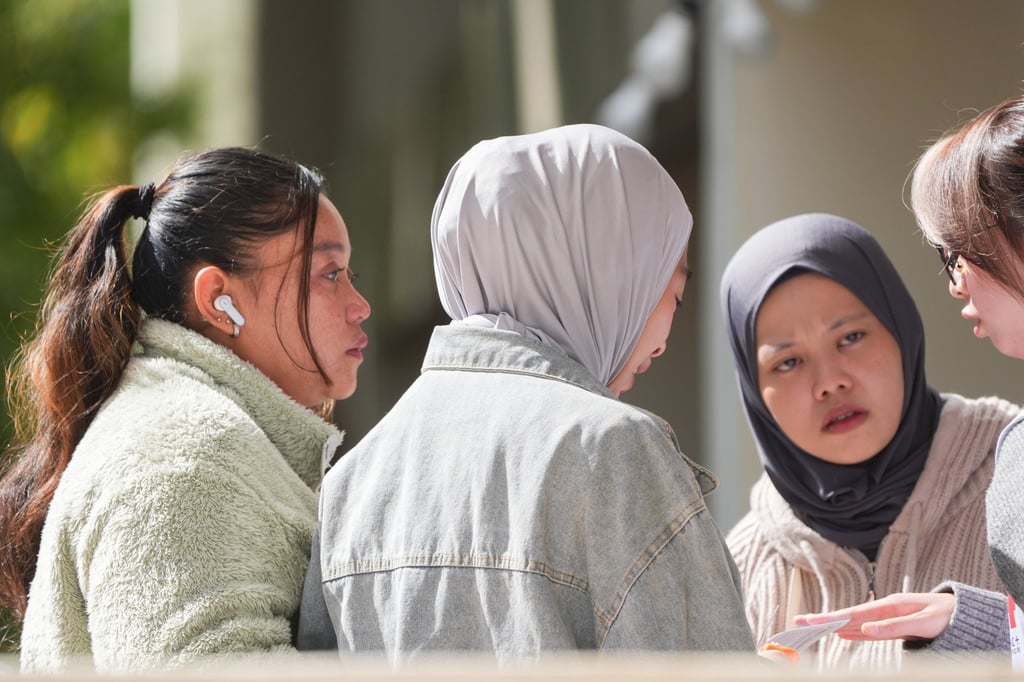 Domestic helpers have lost friends and been displaced along with their employers. Photo: Eugene Lee