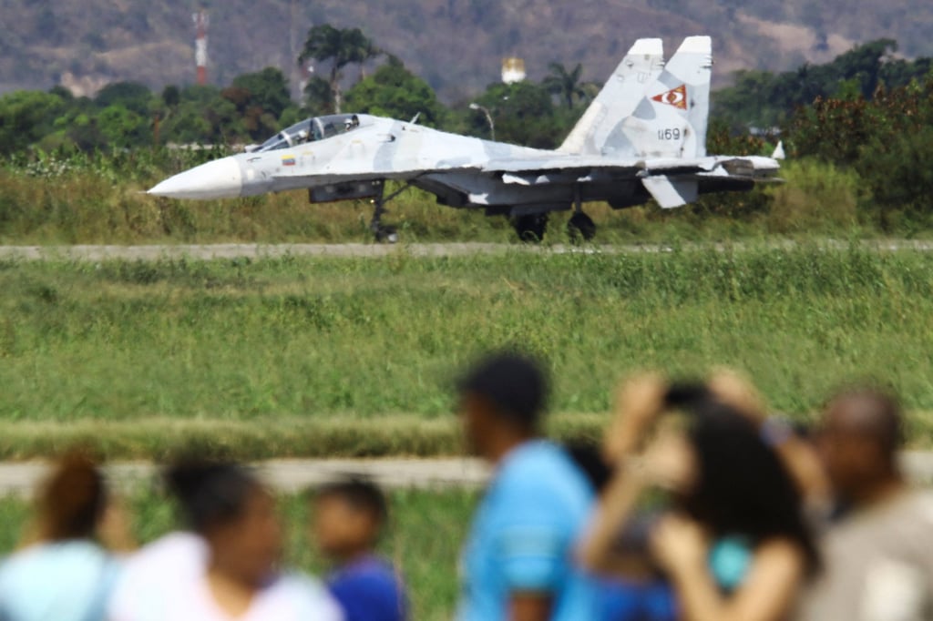 A MiG fighter jet at the Industrial Aviation Expo in Maracay, Venezuela on Saturday. Photo: Reuters A MiG fighter jet at the Industrial Aviation Expo in Maracay, Venezuela on Saturday. Photo: Reuters