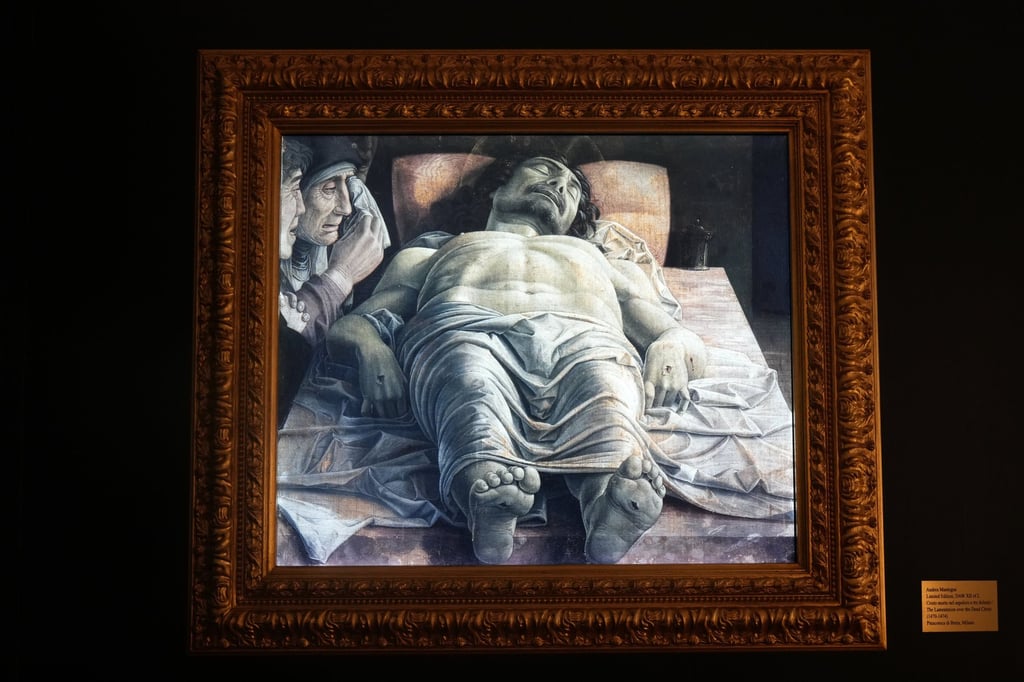 A high-definition digital version of Andrea Mantegna’s Lamentation over the Dead Christ hangs at the Brera Art Gallery in Milan, Italy. Photo: AP