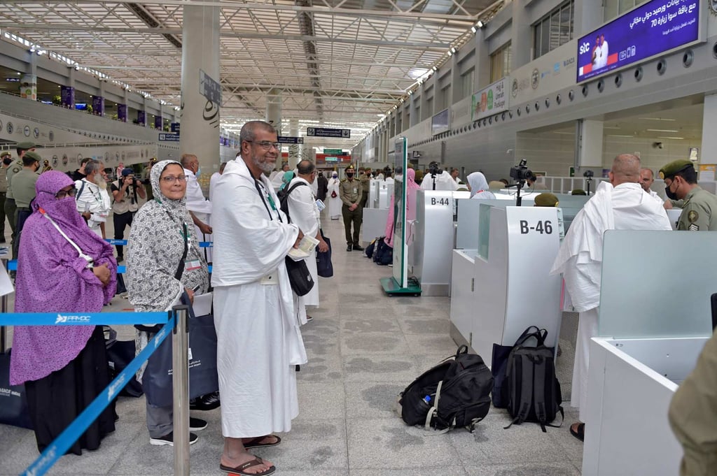 Muslim pilgrims go through passport control on arrival at King Abdulaziz International Airport in Saudi Arabia’s Red Sea coastal city of Jeddah on June 5, 2022, before the annual haj pilgrimage in the holy city of Mecca. Photo: AFP
