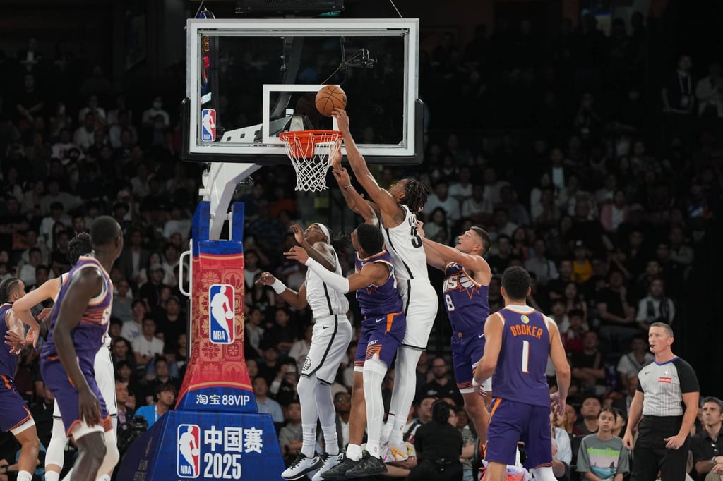 The Brooklyn Nets (in white) take on the Phoenix Suns in Macau in October. Photo: Karma Lo