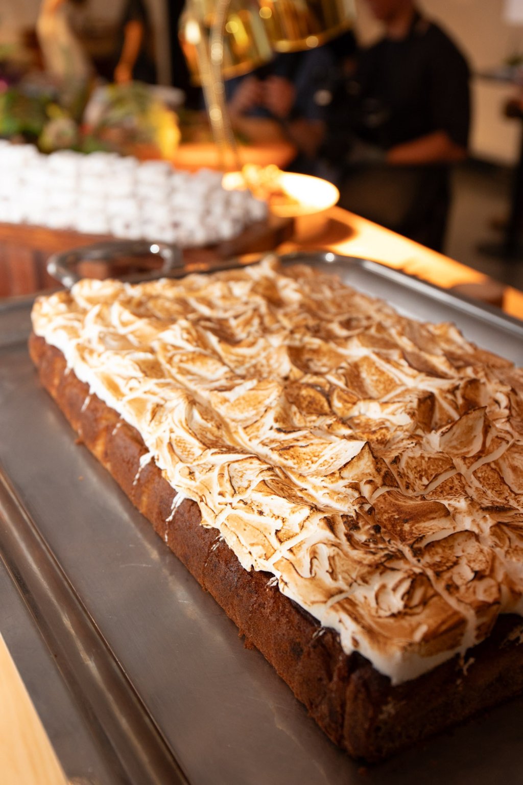 Banana bread with Italian meringue at a Rescued Feast event by Chomp. Photo: courtesy The Rescued Feast