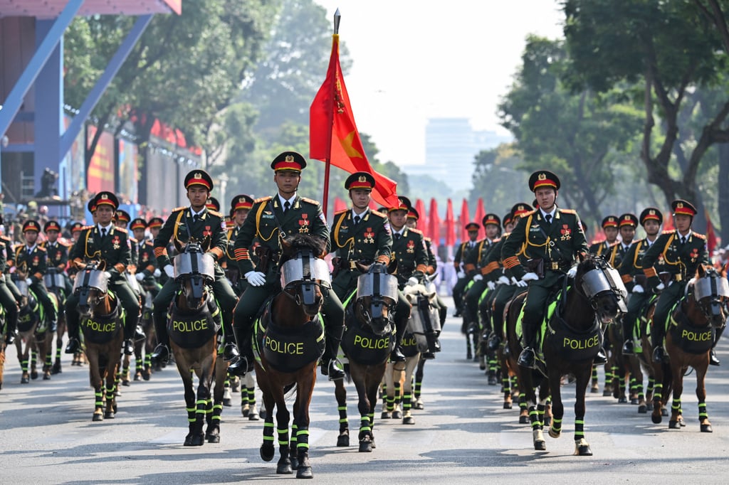 Horse-mounted Vietnamese police parade through Ho Chi Minh City in April, marking the 50th anniversary of the end of the Vietnam war. Photo: AFP
