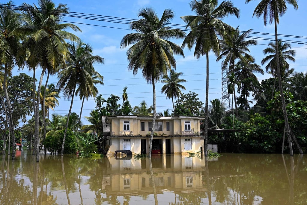 A home is seen inundated by floodwaters on the outskirts of Colombo, Sri Lanka, on Monday. Photo: AFP A home is seen inundated by floodwaters on the outskirts of Colombo, Sri Lanka, on Monday. Photo: AFP