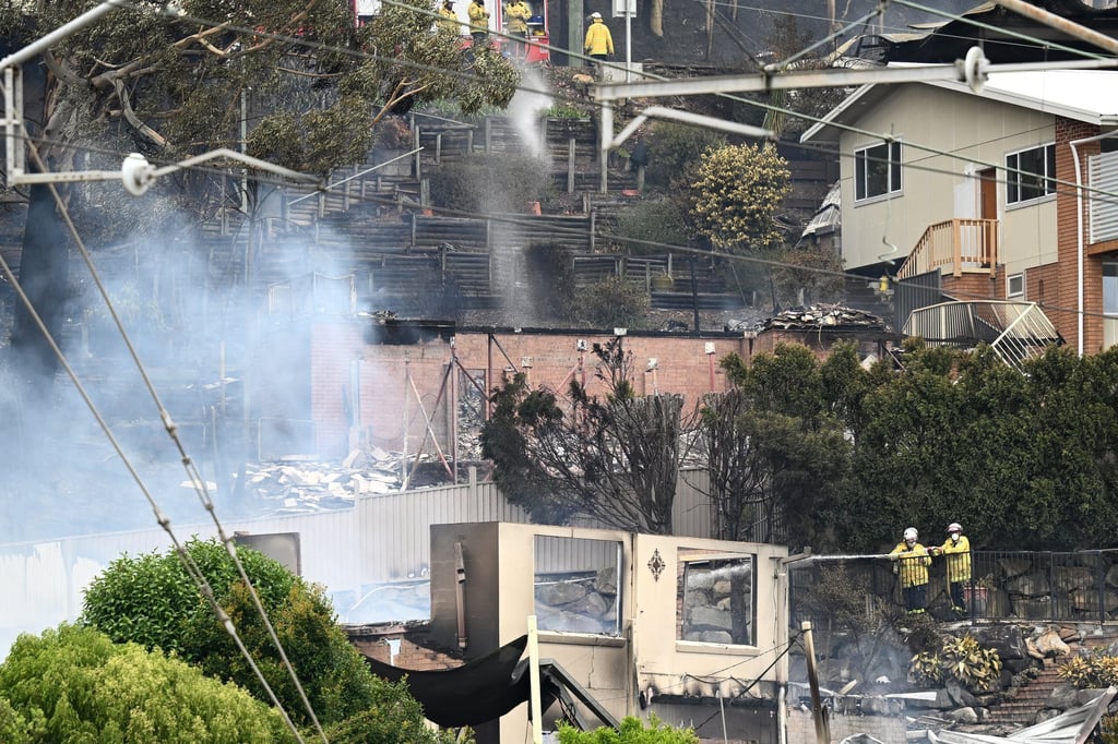 Homes hit by bushfire in the Koolewong area on the Central Coast, New South Wales. Photo: EPA