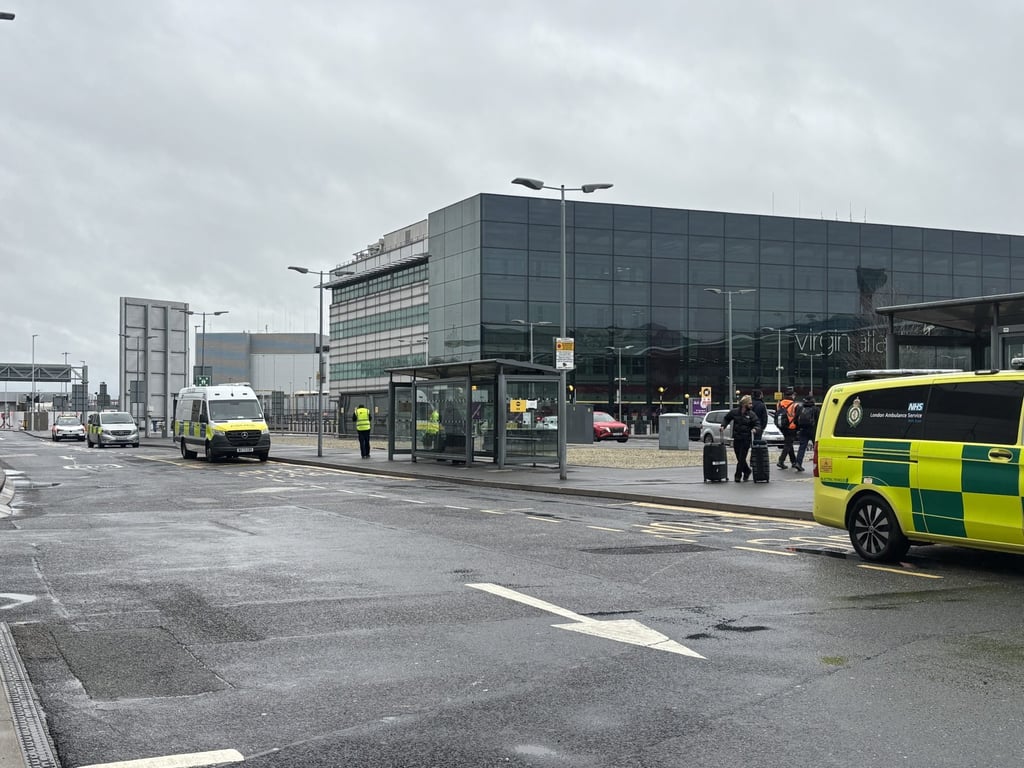 Emergency vehicles outside Terminal 3. Photo: dpa Emergency vehicles outside Terminal 3. Photo: dpa