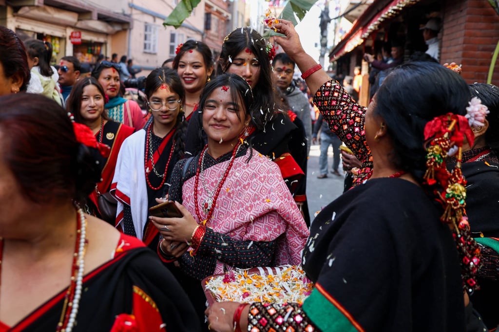 Nepali women and girls take part in a traditional celebration in Kathmandu, Nepal, on Thursday. Photo: Xinhua Nepali women and girls take part in a traditional celebration in Kathmandu, Nepal, on Thursday. Photo: Xinhua