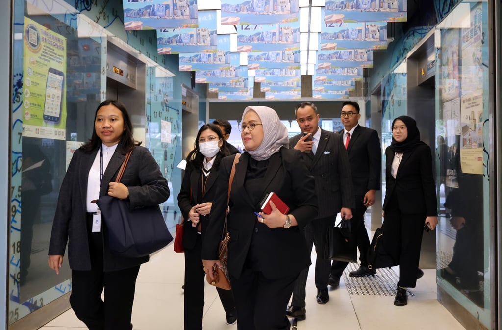 The Indonesian team heads off after a meeting with Hong Kong officials from various departments. Photo: Jelly Tse The Indonesian team heads off after a meeting with Hong Kong officials from various departments. Photo: Jelly Tse
