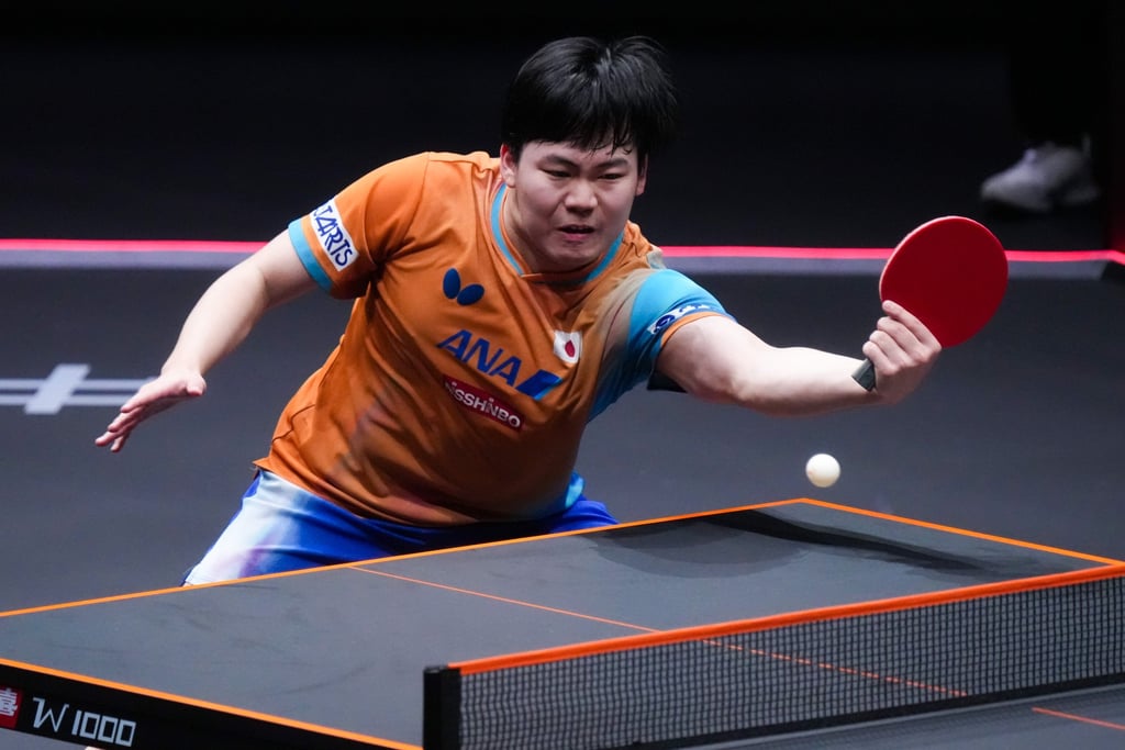 Matsushima giving Wang a run for his money during a close contest. Photo: Xinhua Matsushima giving Wang a run for his money during a close contest. Photo: Xinhua