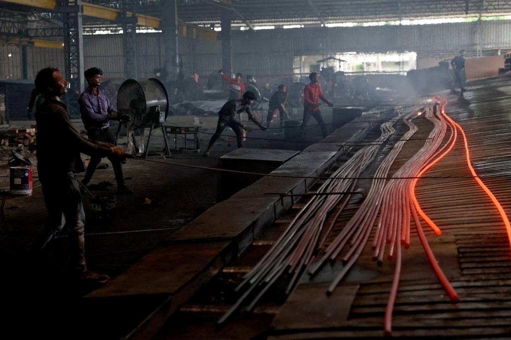 Employees work at a steel processing plant in Mandi Gobindgarh, India’s Punjab state, in August. Photo: Reuters Employees work at a steel processing plant in Mandi Gobindgarh, India’s Punjab state, in August. Photo: Reuters