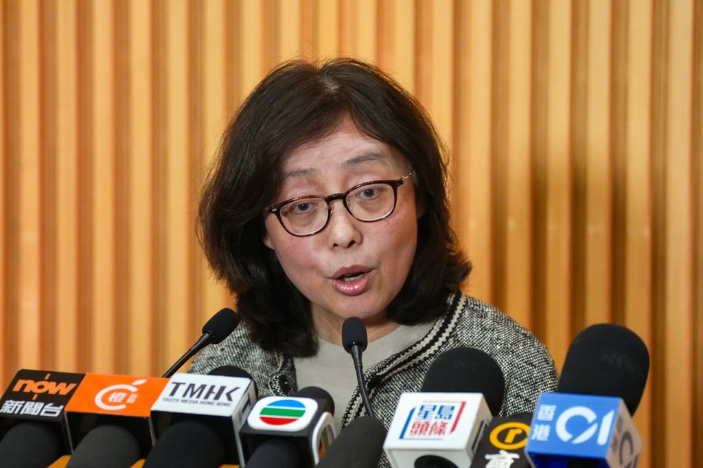 Secretary for Development Bernadette Linn ordered the removal of nets from buildings citywide undergoing major maintenance after falsified certificates for plastic mesh were reported. Photo: Karma Lo Secretary for Development Bernadette Linn ordered the removal of nets from buildings citywide undergoing major maintenance after falsified certificates for plastic mesh were reported. Photo: Karma Lo