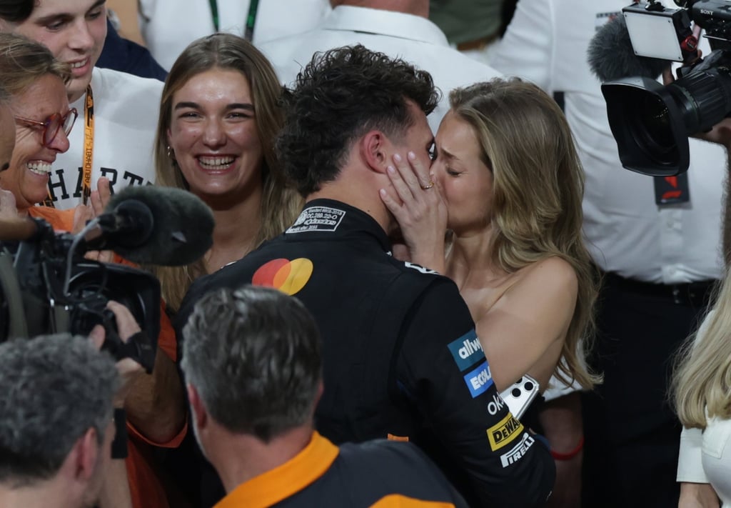 McLaren driver Lando Norris of Britain and girlfriend Margarida Corceiro kiss after he wins the 2025 Formula One world championship in Abu Dhabi, United Arab Emirates, on December 7. Photo: EPA McLaren driver Lando Norris of Britain and girlfriend Margarida Corceiro kiss after he wins the 2025 Formula One world championship in Abu Dhabi, United Arab Emirates, on December 7. Photo: EPA