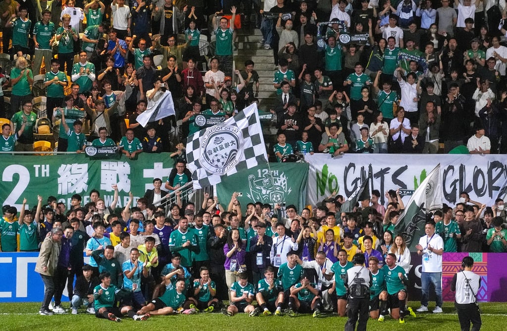 Tai Po players and staff take photos with fans after completing their group stage games. Photo: Elson Li Tai Po players and staff take photos with fans after completing their group stage games. Photo: Elson Li