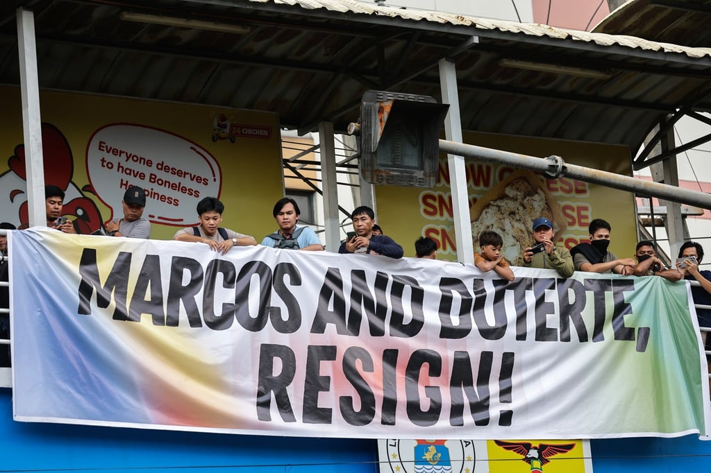 A banner calling for the resignation of Philippine President Ferdinand Marcos Jnr and Vice-President Sara Duterte hangs on a crossing bridge in Manila last month. Photo: EPA A banner calling for the resignation of Philippine President Ferdinand Marcos Jnr and Vice-President Sara Duterte hangs on a crossing bridge in Manila last month. Photo: EPA