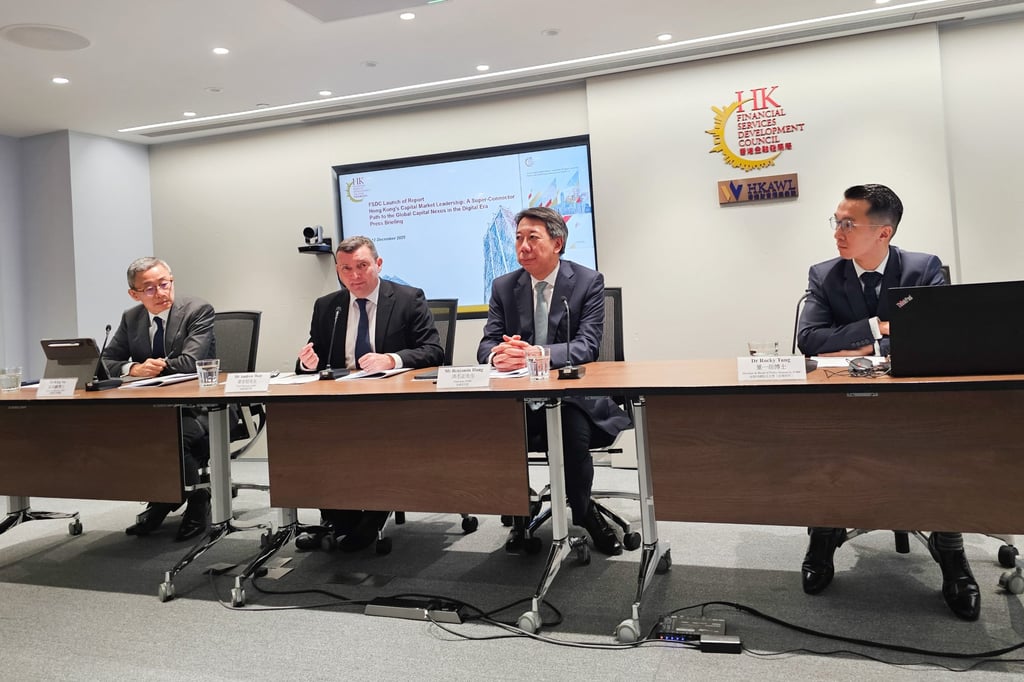 Presenting the FSDC paper are, from left, Au King-lun, Andrew Weir, Benjamin Hung and Rocky Tung. Photo: Enoch Yiu Presenting the FSDC paper are, from left, Au King-lun, Andrew Weir, Benjamin Hung and Rocky Tung. Photo: Enoch Yiu