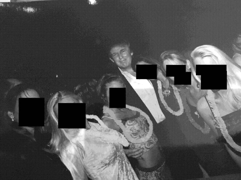 A black-and-white photo of Donald Trump with several women was among the images released on Friday. Photo: House Oversight Committee A black-and-white photo of Donald Trump with several women was among the images released on Friday. Photo: House Oversight Committee
