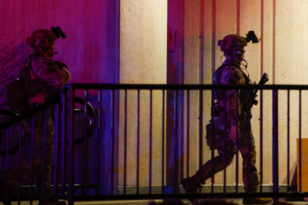 Swat team members at the scene. Photo: The Sun Chronicle via AP Swat team members at the scene. Photo: The Sun Chronicle via AP