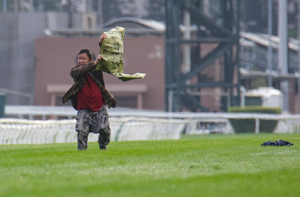 A man ran onto the track during the Hong Kong Cup. Photo: Kenneth Chan