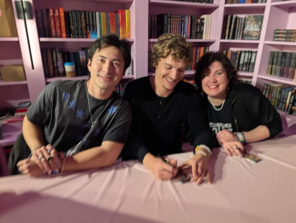 Rachel Reid with the stars of Heated Rivalry, Hudson Williams and Connor Storrie. Photo: @rachelreidwrites/Instagram Rachel Reid with the stars of Heated Rivalry, Hudson Williams and Connor Storrie. Photo: @rachelreidwrites/Instagram