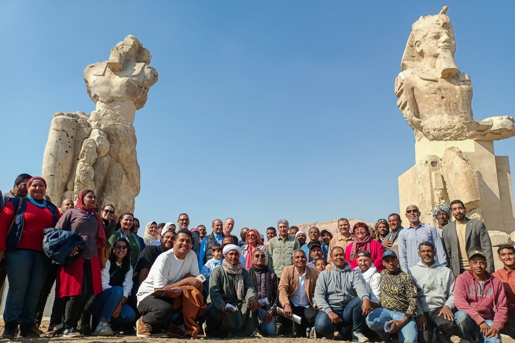 Sherif Fathy, Egypt’s tourism and antiquities minister, centre, with antiquity workers in front of the alabaster statues of ancient Egyptian King Amenhotep III, in Luxor on Sunday. Photo: EPA Sherif Fathy, Egypt’s tourism and antiquities minister, centre, with antiquity workers in front of the alabaster statues of ancient Egyptian King Amenhotep III, in Luxor on Sunday. Photo: EPA