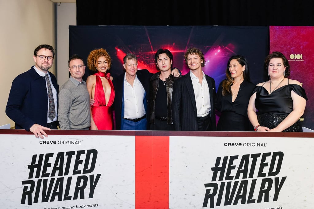 Rachel Reid (far right) with cast members and the team behind Heated Rivalry, at its Toronto premiere. Photo: Getty Images Rachel Reid (far right) with cast members and the team behind Heated Rivalry, at its Toronto premiere. Photo: Getty Images