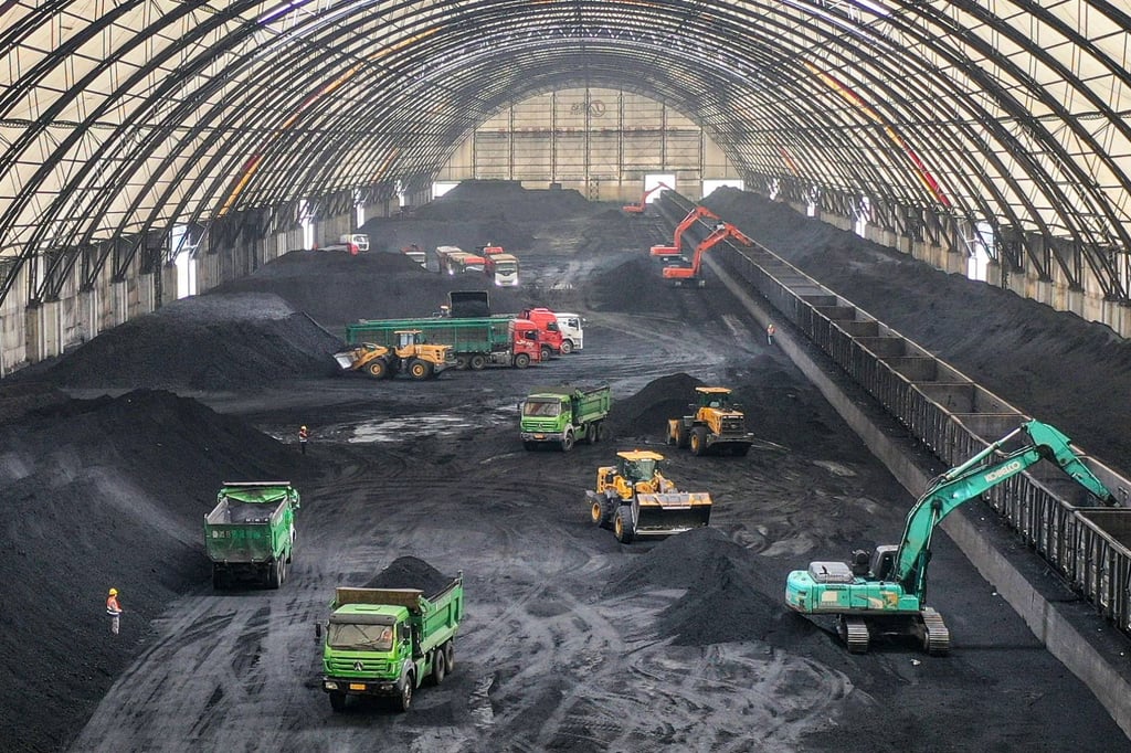 Excavators unload coal in Binzhou, in eastern China’s Shandong province. Photo: AFP Excavators unload coal in Binzhou, in eastern China’s Shandong province. Photo: AFP