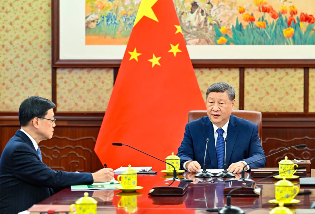 Chief Executive John Lee (left) is on an annual three-day duty visit to Beijing to update central leaders, including President Xi Jinping (right), on the work of the Hong Kong government. Photo: Xinhua
