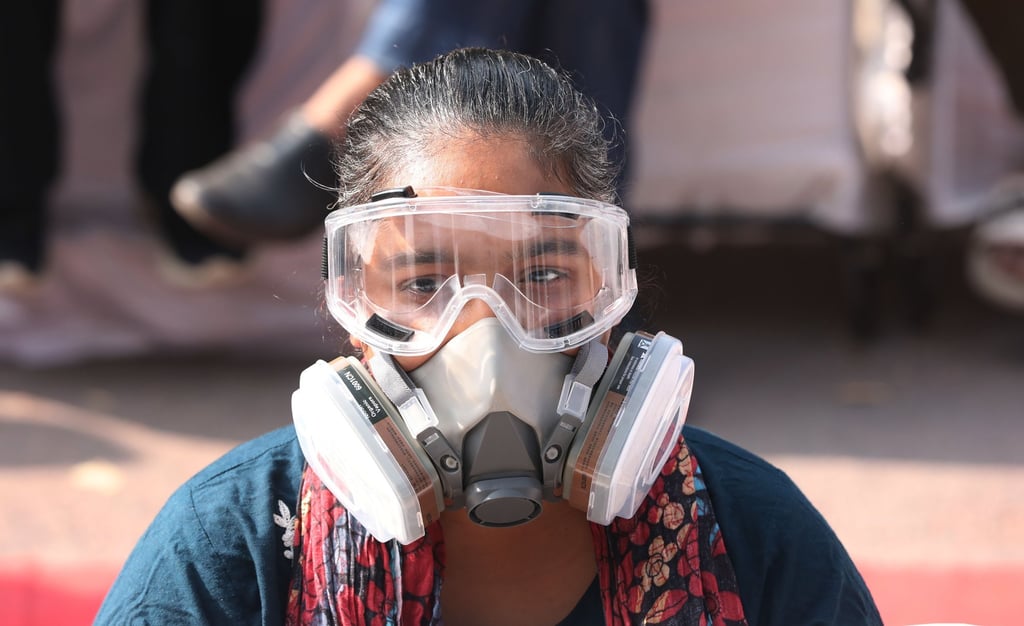A demonstrator wearing a gas mask takes part in a protest against rising pollution near Parliament House in New Delhi earlier this month. Photo: EPA A demonstrator wearing a gas mask takes part in a protest against rising pollution near Parliament House in New Delhi earlier this month. Photo: EPA