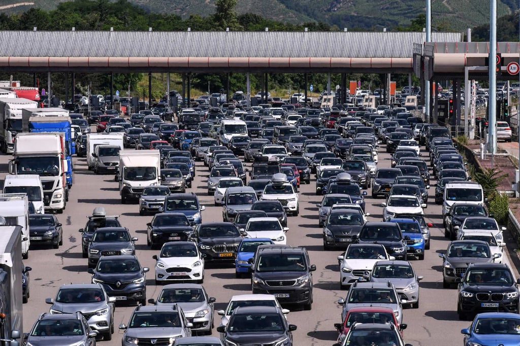 Motorists on the A7 motorway between Lyon and Vienne, southeastern France, during a heavy traffic jam. Photo: AFP Motorists on the A7 motorway between Lyon and Vienne, southeastern France, during a heavy traffic jam. Photo: AFP