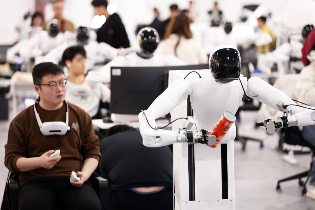 Technicians train humanoid robots at a data collection centre run by the robotics company Agibot in Shanghai. Photo: Getty Images