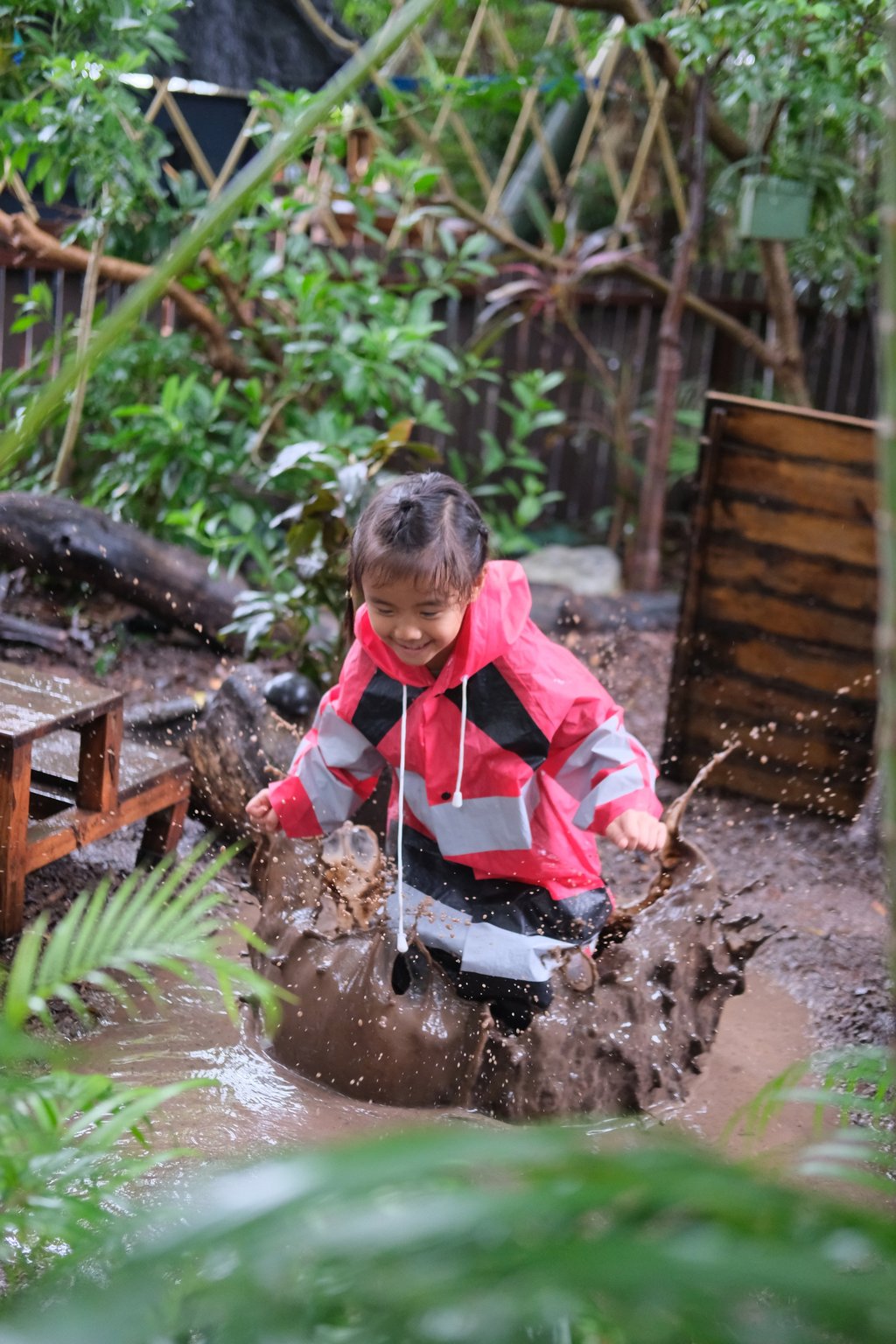 A pupil at International College Hong Kong’s outdoor campus for younger students gets hands on with nature. Photo: Handout
