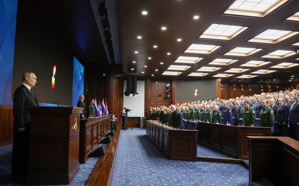 Russia’s President Vladimir Putin observes a minute of silence with military leaders in Moscow on Wednesday. Photo: Sputnik via Reuters