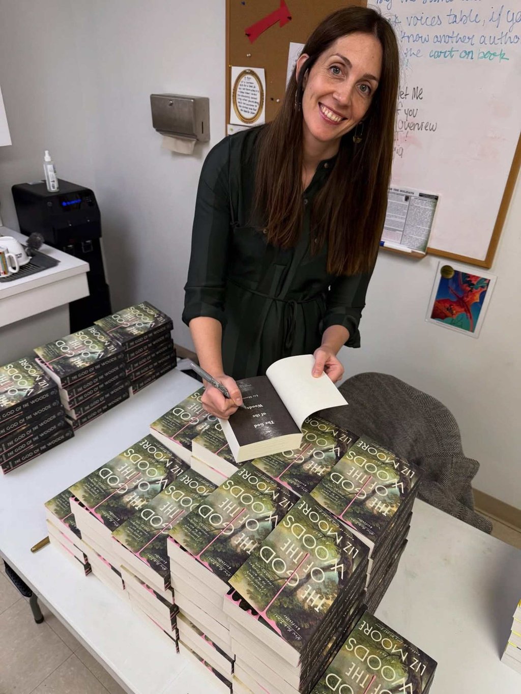 Liz Moore signing copies of her book The God of the Woods. Photo: @lizmoorebooks/Instagram Liz Moore signing copies of her book The God of the Woods. Photo: @lizmoorebooks/Instagram