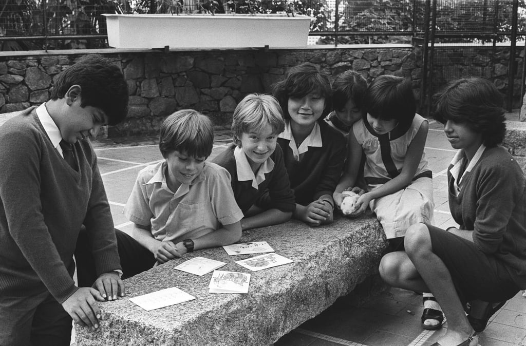 Island School students admire the latest Christmas card designs in 1984. Photo: SCMP Archives
