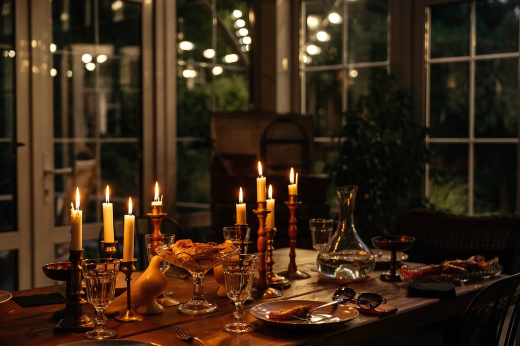 Candles can make an atmospheric addition to a dinner table – but they can be problematic for some guests, so take some precautions. Photo: Shutterstock