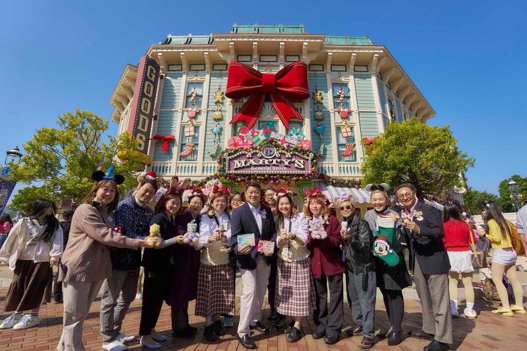 Hong Kong Disneyland cast members. The Holiday Wishes Postcards are sold for HK$10 each. Photo: Handout