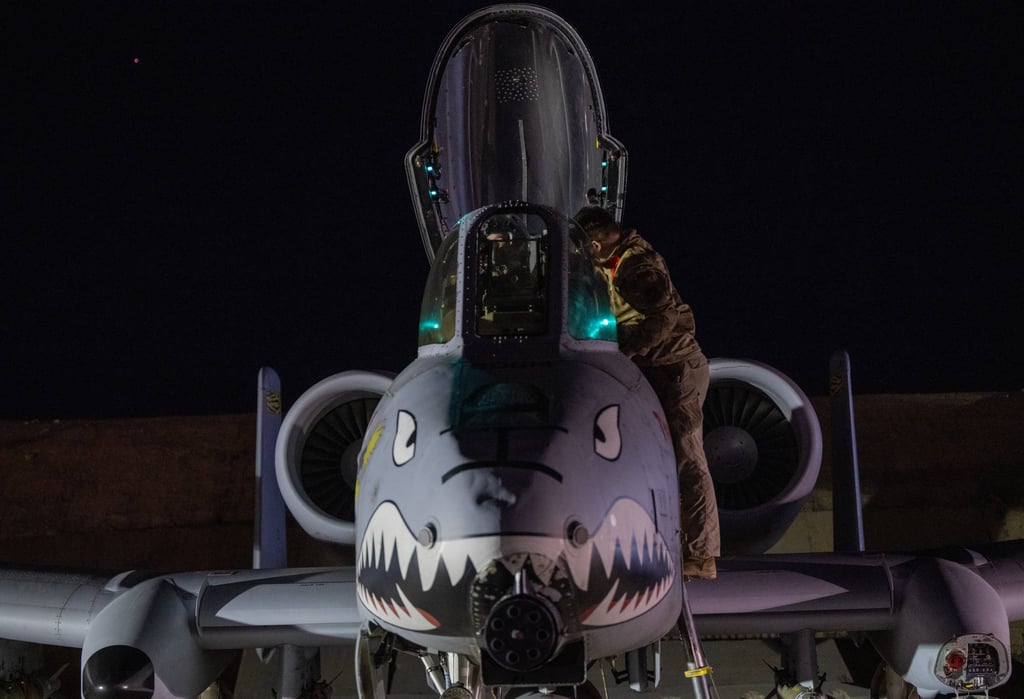 A US airman prepares an A-10 Thunderbolt II for flight from a base in the US Central Command area of responsibility on Friday. Photo: US Air Force/AP A US airman prepares an A-10 Thunderbolt II for flight from a base in the US Central Command area of responsibility on Friday. Photo: US Air Force/AP