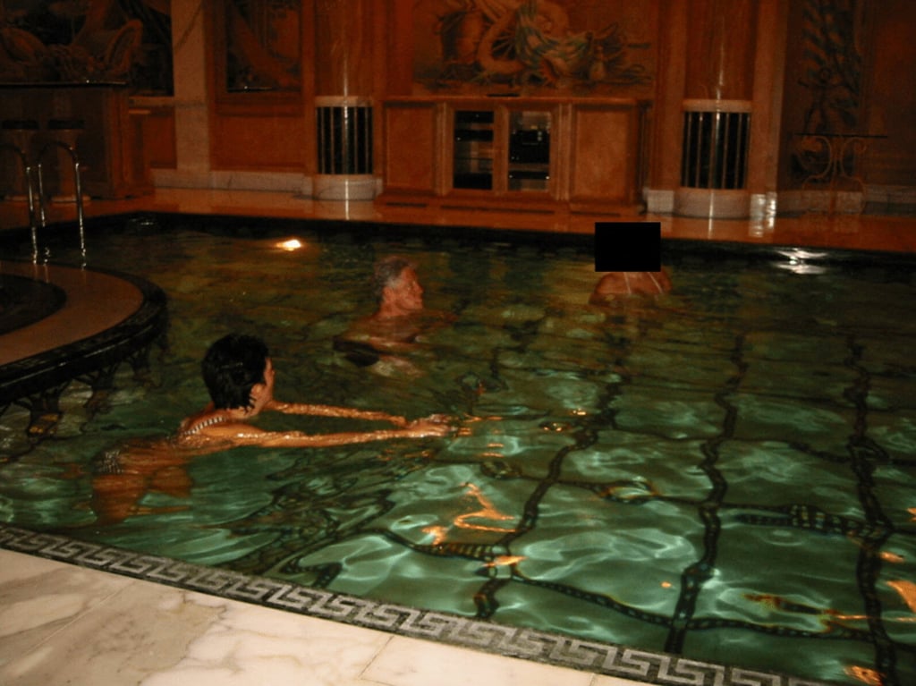 Former US president Bill Clinton swims in a pool in this image released on Friday. Photo: US Justice Department via Reuters