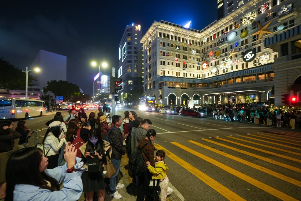 The traffic island near the hotel is packed with people. Photo: Sun Yeung